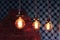 Luxury beautiful retro edison light round glowing tungsten three lamps decor.