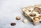 Luxury belgian chocolate and biscuit cookies selection in original golden tray and white kitchen table background