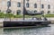 Luxury black yacht by the quayside