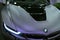 Luxury BMW i8 hybrid electric coupe. Plug-in hybrid sport car. Concept electric vehicle. Dark Matt colour. Car exterior details