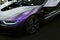 Luxury BMW i8 hybrid electric coupe. Plug-in hybrid sport car. Concept electric vehicle. Dark Matt colour. Car exterior details.