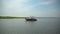 Luxury boat near the marsh and dock of Ho Hum beach on Fire Island