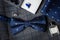 Luxury bow tie close up with vintage suit, cufflink, perfume bottle