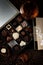Luxury box of pralines received as a gift new a glass of brandy