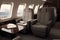 Luxury business jet plane airplane private jet empty interior during flight fast bright luxurious seat leather chair