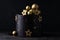 Luxury cake with dark blue cream cheese frosting decorated with golden chocolate stars and spheres. Birthday space themed cake on