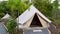 Luxury Camping Tents Resort. Glamping Tents Campsite or Hotel, Tropical Greenery