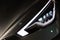 Luxury car headlight detail close-up