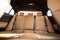 Luxury car rear leather seats row. Interior of new modern clean expensive car. Passenger seats with leather. Closeup