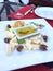 Luxury cheese plate with honey and nuts