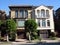 Luxury condo townhouse large arched windows and balconies