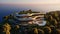 Luxury contemporaty villa on a mountain hill with a view on ocean. Generative AI