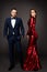 Luxury Couple, Beautiful Fashion Woman in Red Dress, Elegant Man in Suit Tuxedo