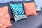 Luxury cozy couch close up with decorative pillows in geometric