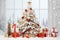 Luxury Cozy warm Christmas background with gift box, ornament decorations and white golden warm tone, happy new year celebration,