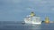 A luxury cruise ship leaving port with two tugs assistance time lapse