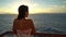 Luxury Cruise ship vacation travel woman enjoying sunset at sea on boat