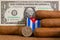 Luxury Cuban cigars with US dollar banknote and coin