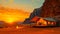 Luxury Desert Glamping in Jordan. Igloo tents in sunset landscape..Warm sunset lighting on a luxury desert dome resort.Igloo