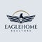 Luxury eagle home logo design template. Modern hawk real estate logo branding.
