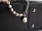 Luxury elegant baroque pearl necklace on black leather case