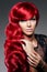 Luxury fashion trendy young woman with red curled hair. Girl w