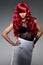 Luxury fashion trendy young woman with red curled hair. Girl w