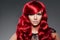 Luxury fashion trendy young woman with red curled hair. Girl w