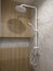 Luxury fully tiled shower with rain head and hand held shower rose