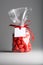 Luxury gift with ribbon of candy strawberries with blank label