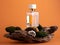 Luxury glass perfume bottle on  wooden product sand with moss orange background