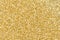 Luxury glitter background in contrast gold color as part of your expensive design.