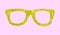 Luxury golden glasses with stars from confetti on pink background.