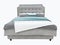 Luxury gray modern bed furniture with upholstery capitone texture headboard and fabric bedclothes. Classic modern