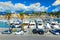 Luxury harbor with yachts, cars and cityscape, Menton, France, Europe