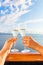 Luxury honeymoon cruise couple toasting champagne. Travel holiday newlyweds drinking with wedding rings holding glasses