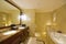 Luxury hotel bathroom and toilet with bath tub & double washing basin