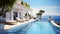 Luxury hotel with pool and view of Mediterranean Sea at sunset, Greece