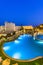 Luxury Hotel Resort with Swimming Poll Illuminated at Sunrise