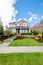 Luxury house with beautiful landscaping on a sunny day