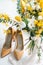 Luxury ivory shoes and bride jewel on the table