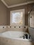 Luxury Jacuzzi and stained-glass window