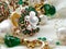 Luxury jewelry Emerald greeen white pearl gold rings and earing jewelry on white background