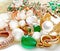 Luxury jewelry Emerald greeen white pearl gold rings and earing jewelry on white background