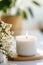 Luxury lighting aromatic scented glass candle display on the grey table in the white bedroom