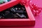 Luxury,Madlen and Dark Ball Chocolate in red color carton box with red  ribbon.