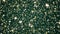 Luxury, magic and happy holidays background, golden sparkling glitter, stars and magical glow on festive green backdrop