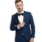 Luxury man in blue tuxedo adjusting his lounge jacket collar