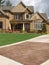 Luxury Model Home Exterior stone driveway