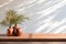 Luxury organic skincare product display on brown wooden counter table with leaf shadow